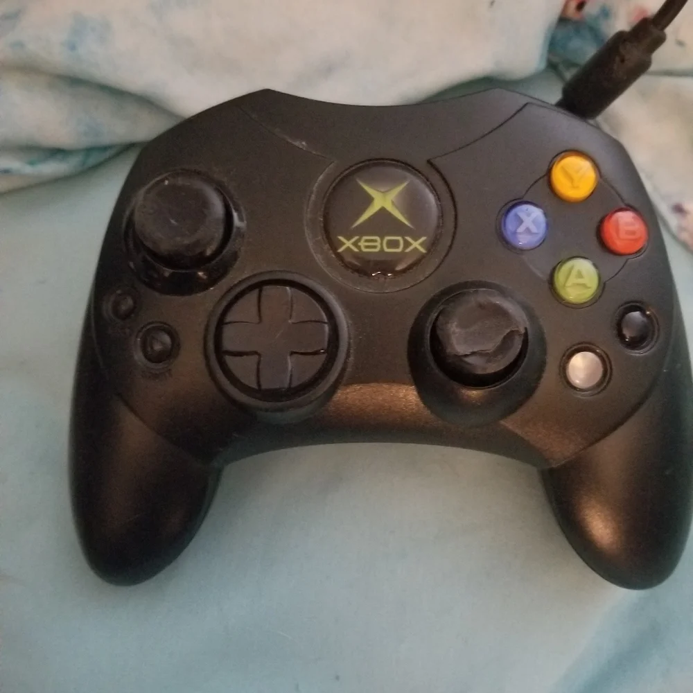 2 Controllers Wireless Xbox 360 & a wired Original X Box with Colored Buttons.
